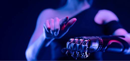 A human hand poised above a robotic hand, symbolizing advanced robotics technology.